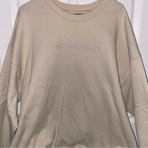 Ariana Grande the light is coming crewneck